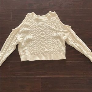 Cold shoulder cropped cable knit sweater